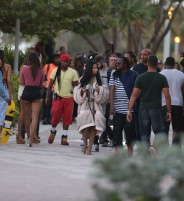 Nicki Minaj wears a fur coat over a white bikini while filming new video in Miami Beach. Pictured: Nicki Minaj Ref: SPL1453030 270217 Picture by: KDNPIX Splash News and Pictures Los Angeles: 310-821-2666 New York: 212-619-2666 London: 870-934-2666 photodesk@splashnews.com